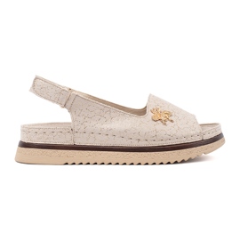 Goodin Sandali beige sulla piattaforma con un pin