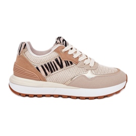 Scarpe sportive femminili sulla piattaforma zebra beige