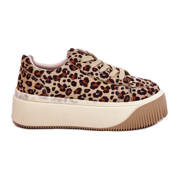 Sneaker su un'enorme piattaforma di leopardo marrone