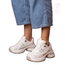 Sneaker sportive bianche con suola massiccia bianca