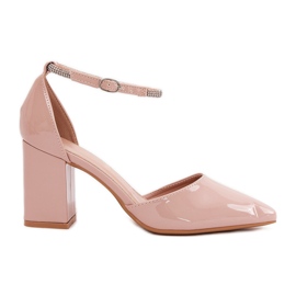 Pompe dipinte con dita puntate sul post beige