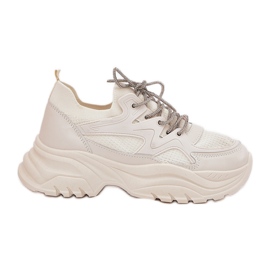 Sneaker femminili su una piattaforma decorativa allacciatura beige