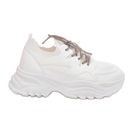 Sneaker da donna su una piattaforma decorativa allacciatura bianca bianco