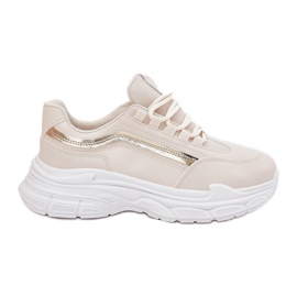 Scarpe sportive da donna con sneaker su una sosa beige spessa