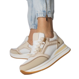 Sneaker sportive beige decorate con un cursore