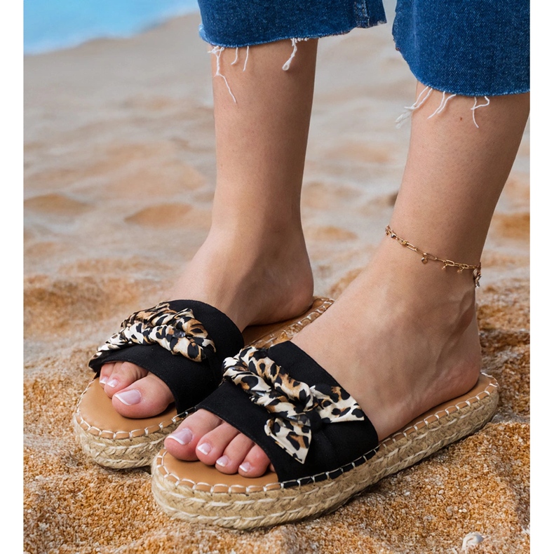 Espadrille nere con un arco nero