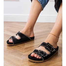 Flip Black Flip con morsetti e ricami su strisce nero