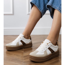 Sneaker leopardate da donna sulla piattaforma bianco