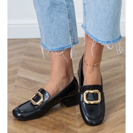 Scarpe a ruote basse da donna nera con una decorazione dorata nero