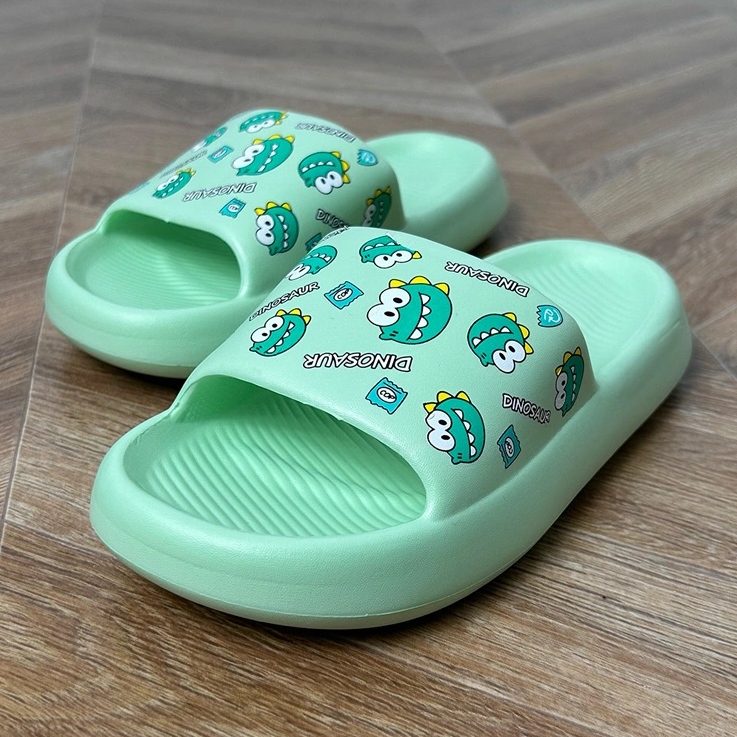Flip per bambini verdi con la stampa verde