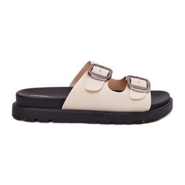 Infradito da donna con fibbie sulla piattaforma beige