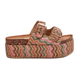 Pantofole da donna su una piattaforma enorme con fibbie a treccia e multicolore beige