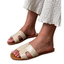 BEIGE Flaps su una suola piatta con la pressione