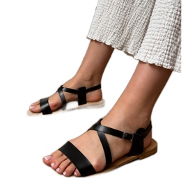 Sandali piatti neri con cintura nero
