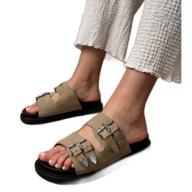 Pantofole da donne verdi con fibbie decorative beige