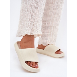 Pantofole di schiuma leggera da donna su una suola ecru spessa bianco