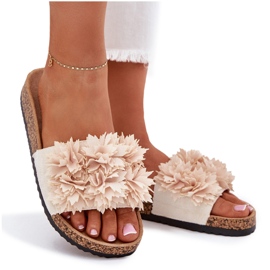 Infradito da donna su una suola di sughero con fiori decorativi beige