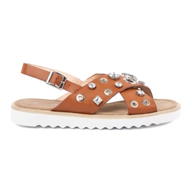 Sandali femminili caramellati con borchie beige