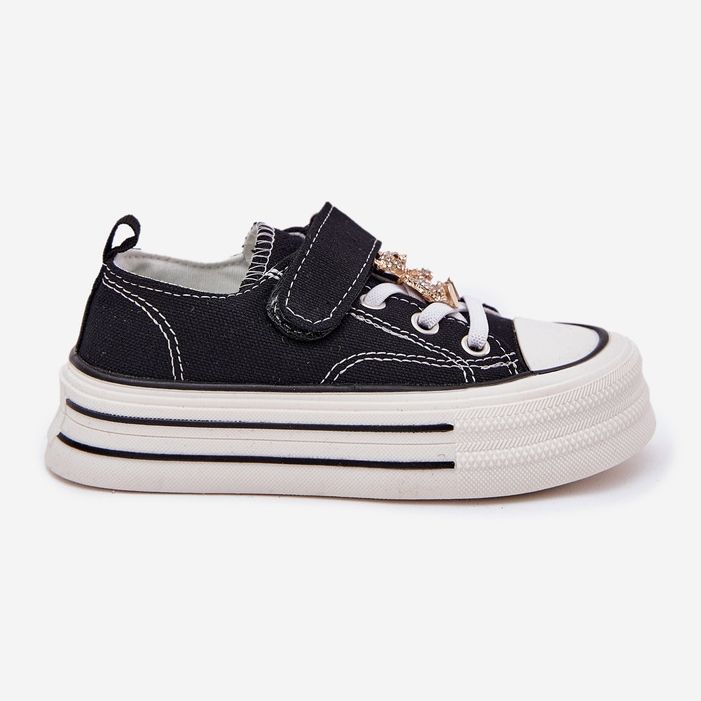 Girls 'Sneaker con una spilla dorata nero