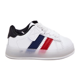 Scarpe da sneaker per bambini con una suola bianca e bianca luminosa bianco