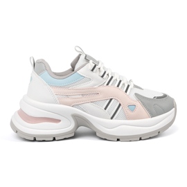 Scarpe sportive da donna pastello sulla piattaforma rosa