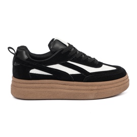 Sneaker da donna nera con inserti bianchi. nero