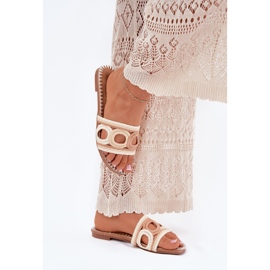 Tacchi piatti delle donne all'uncinetto beige