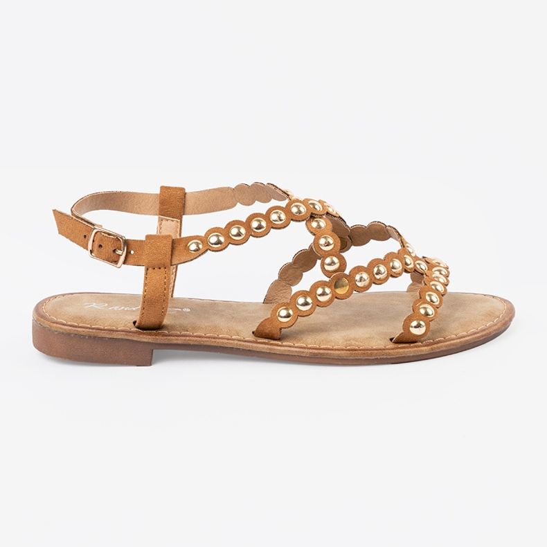 Sandali piatti caramellati con borchie beige
