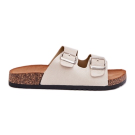 Pantofole da donna su una piattaforma di sughero con fibbie beige