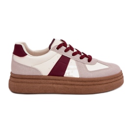 Sneaker femminili sulla piattaforma bordeautica rosso