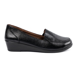 Scarpe da donna con una consistenza della pelle di un serpente nero