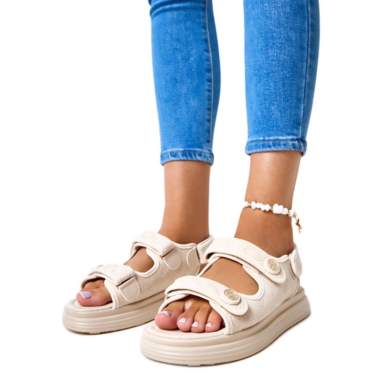 Sandali beige con cinture di barba regolabili