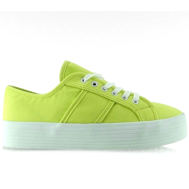 Sneakers con suola verde fluorescente