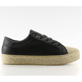 Scarpe da ginnastica su una scarpa di tela nera NA05P nero