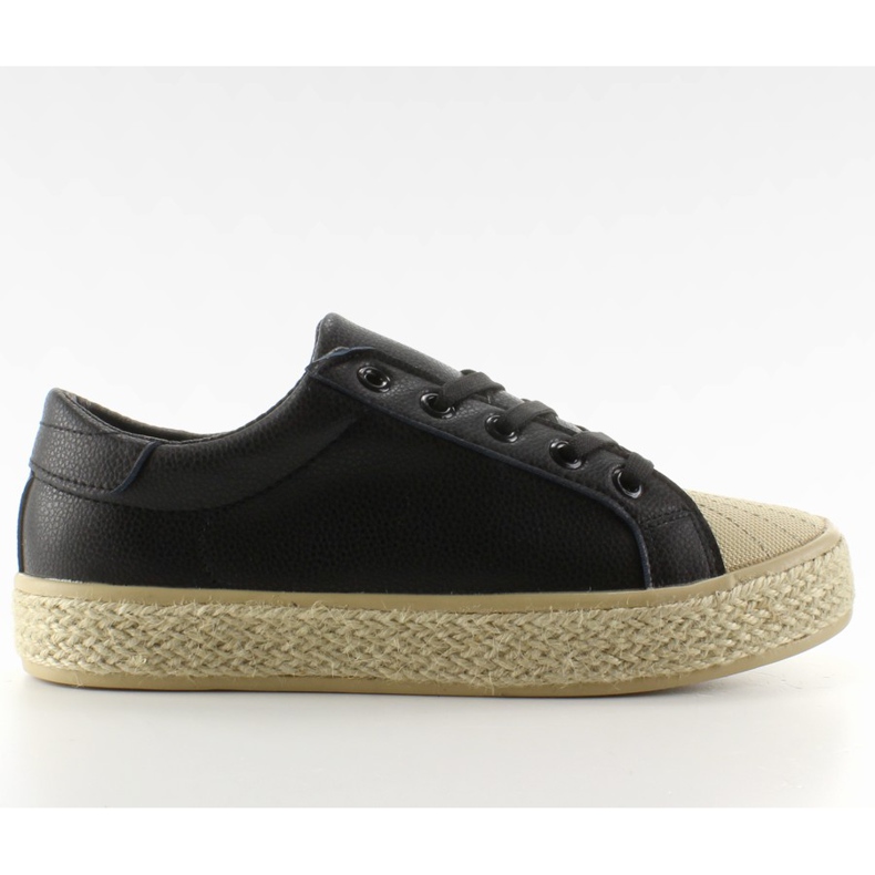 Scarpe da ginnastica su una scarpa di tela nera NA05P nero