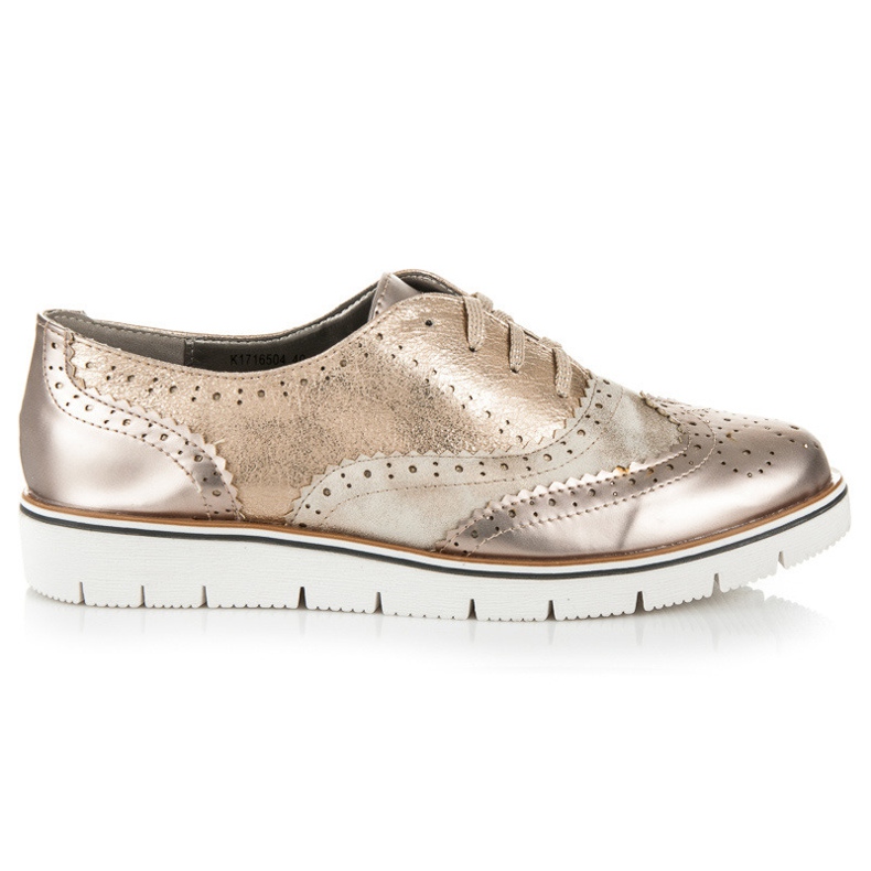 Kylie Brogue dorate sulla rilegatura d'oro