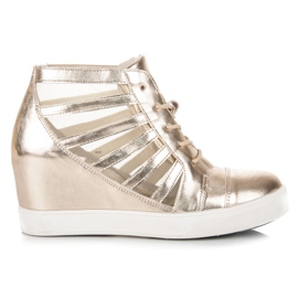 Kylie Sneakers con zeppa dorata d'oro