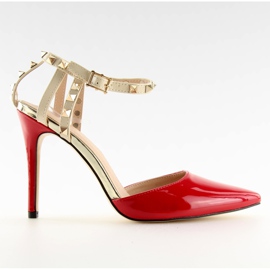 Décolleté su spilla con borchie rosse At rosso