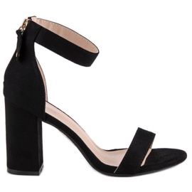 Sandali con zip in camoscio nero