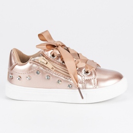 Scarpe da ginnastica dorate con nastro d'oro