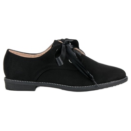Scarpe con nastro di raso nero