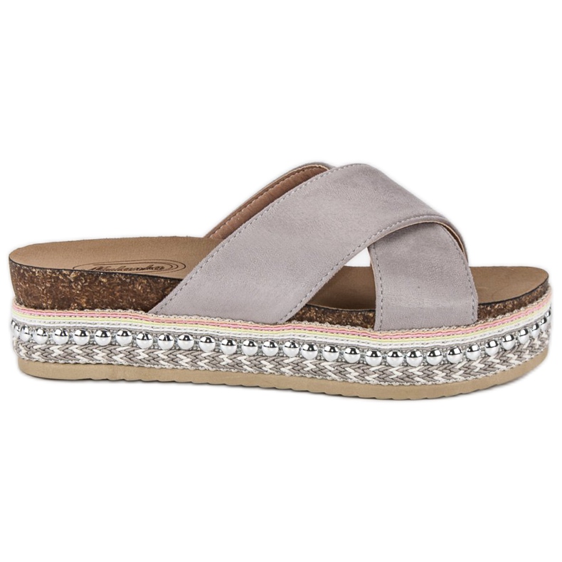 Ciabatte grigie sulla piattaforma grigio