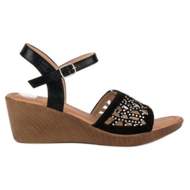 Renda Eleganti sandali con zeppa nero