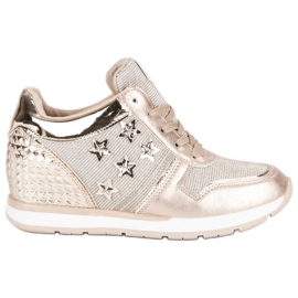 Sneakers sneakers dorate d'oro