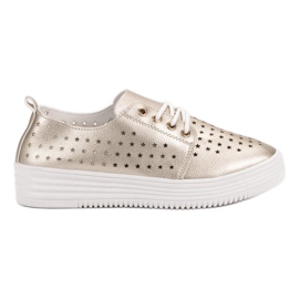 Sneakers traforate dorate d'oro