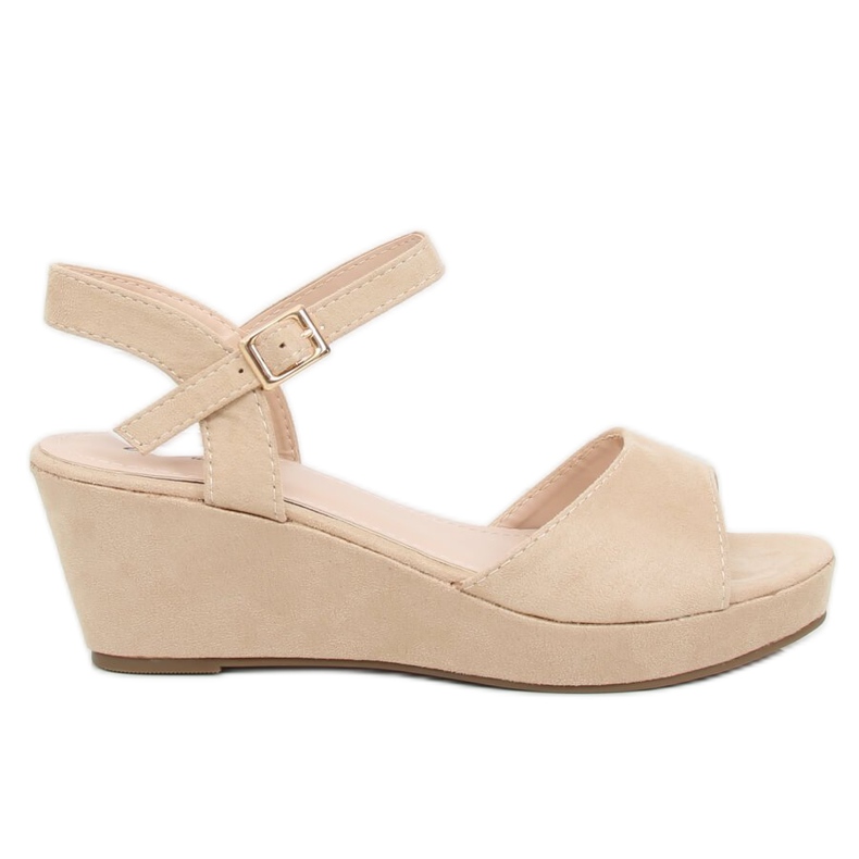 Sandali su una zeppa bassa beige K-7 Beige
