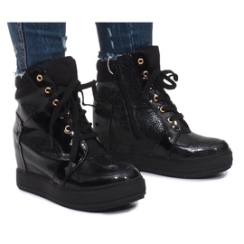 Sneakers laccate nere sulla zeppa Snake nero
