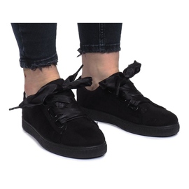 Sneakers nere con fiocchi Salomé nero