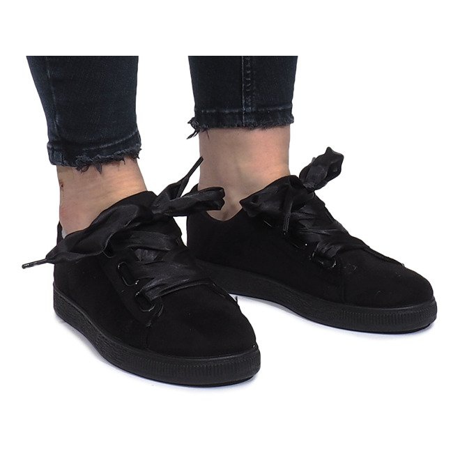 Sneakers nere con fiocchi Salomé nero
