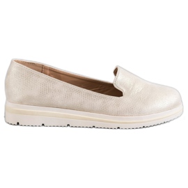 Kayla Signori beige